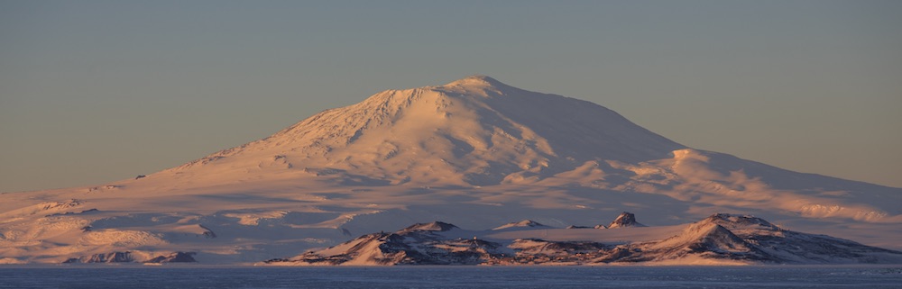 McMurdo Station and Mt. Erebus at sunset from the Pegasus runway. 