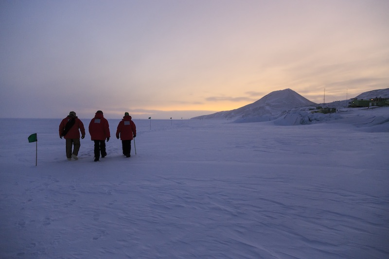 Hiking on the sea ice near New Zealand’s Scott Base on Ross Island. Scott Base is the cluster of green buildings at the right edge of this photograph. 