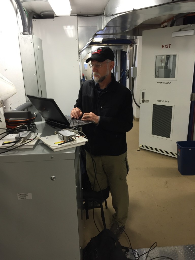 Dr. Dale Lawrence working to fine-tune the autopilot and get things set up for flight.