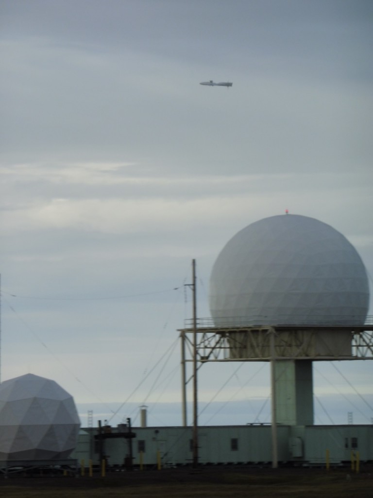 The DataHawk flying past the USAF radars, with wings as level as possible.