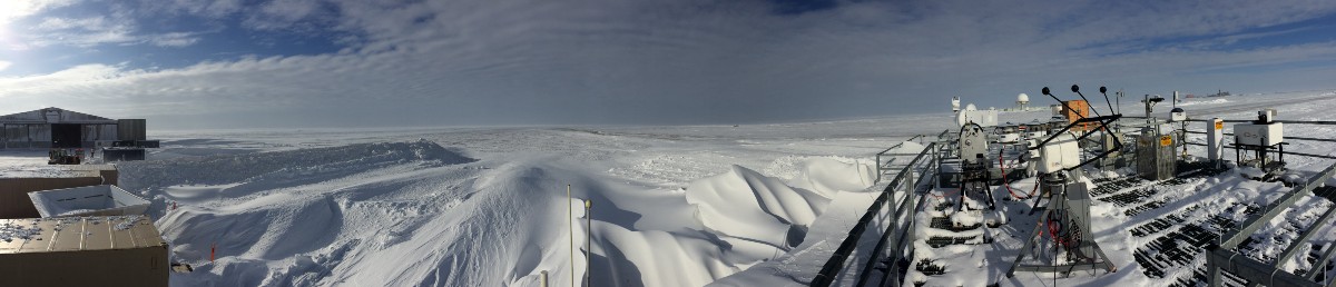 View from the rooftop deck of the AMF-3 this morning. Note the giant snow drifts being produced by the wind behind the facility! 